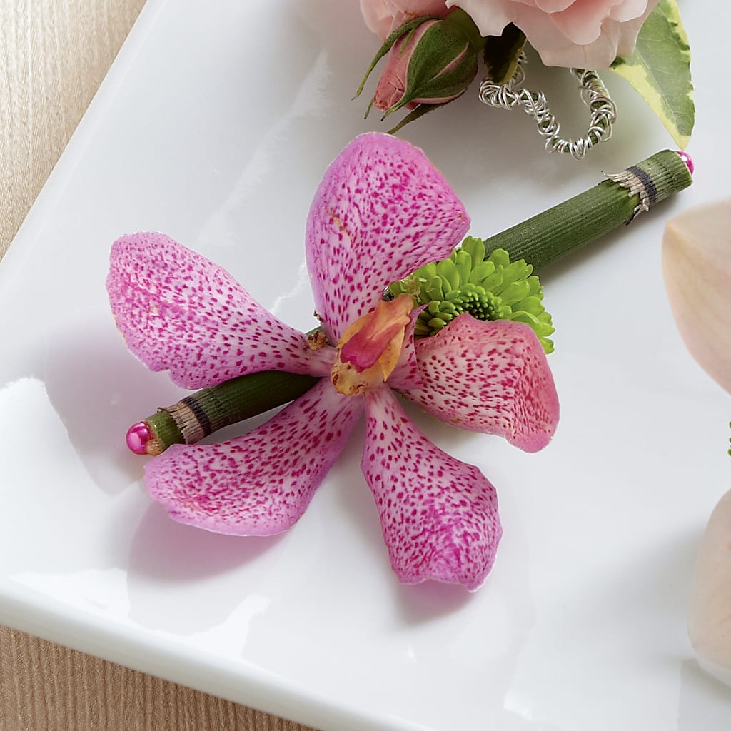 Pink Mokara Boutonniere – Village Bloom Florist, Folsom LA